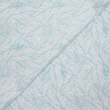 Popeline polycoton imprimée feuillages vert fond blanc