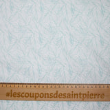 Popeline polycoton imprimée feuillages vert fond blanc