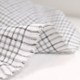 Popeline polycoton tissée-teinte à carreaux Isaac gris fond blanc