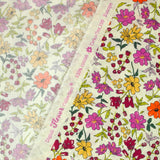 Coton imprimé Vittoria fleurs vintage fond écru au mètre