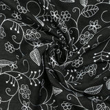 Twill de polyester brodé Solène fond noir