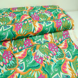 Coton imprimé Ginevra rose et orange fond vert au mètre