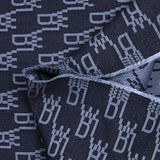 Polyviscose jacquard initials navy background