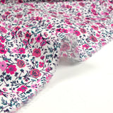 Coton imprimé Anna fleurs rose et fuchsia fond blanc au mètre