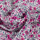 Coton imprimé Anna fleurs rose et fuchsia fond blanc au mètre