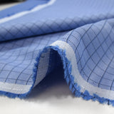 Popeline polycoton tissée-teinte à carreaux Émilien fond bleu