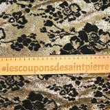Maille lurex fleurs noires velours fond doré