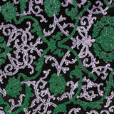 Maille lurex arabesque vert fond noir