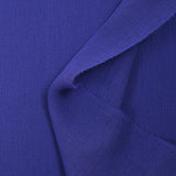 Gaze de polyester unie bleu roi