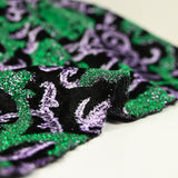 Maille lurex arabesque vert fond noir