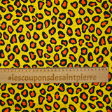 Satin polyester imprimé léopard fond jaune