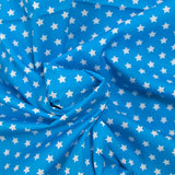 Coton imprimé étoile 1cm turquoise