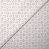 Piqué de coton imprimé brindille dans le vent vieux rose fond blanc