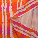 Viscose imprimée rayée effet tie & dye orange et fuchsia