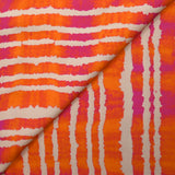 Viscose imprimée rayée effet tie & dye orange et fuchsia