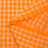 Seersucker vichy naranja neón y crudo