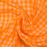Seersucker vichy naranja neón y crudo