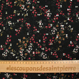 Mousseline crinkle imprimée liane de fleurs fond noir