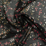 Mousseline crinkle imprimée liane de fleurs fond noir