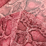 Mousseline imprimée reptile vieux rose