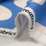 Satin de viscose imprimé ondulations écrues fond ciel