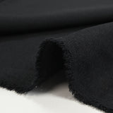 Tissu tailleur laine mélangée souple sergé noir profond