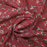 Crêpe viscose imprimé lien floral fond bordeaux
