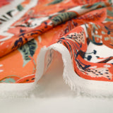 Viscose imprimée fleurs de la jungle corail fond blanc