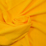 Crépon viscose rayé lurex doré fond mangue