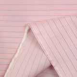 Coton tissée-teinte marine fond rose
