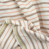 Coton tissé-teint rayé camel fond blanc