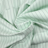 Sergé de coton rayé fond vert pâle