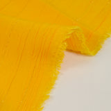 Crépon viscose rayé lurex doré fond mangue