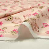 Coton imprimé ours et santiag fleurie fond rose