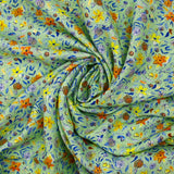 Lin viscose imprimé automne en fleurs fond vert d'eau