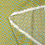 Viscose imprimée fleurs graphiques bleues fond jaune soleil