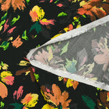 Viscose imprimée gribouillis de fleurs fond noir