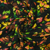 Viscose imprimée gribouillis de fleurs fond noir