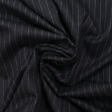 Tissu tailleur flanelle 100% laine Super 120's rayé 1 cm fond bleu nuit