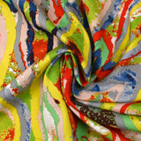 Viscose imprimée évasion triangulaire rouge, vert et gris