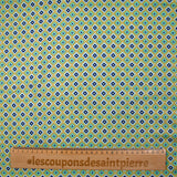 Viscose imprimée fleurs graphiques marine fond jaune beurre