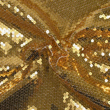 Sequins dorés sur mousseline