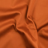 Poplina de algodón de color naranja ardido