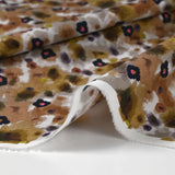 Popelín de algodón estampado tierra desconocida marrón y gris