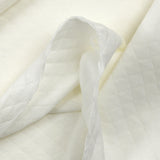 Jersey matelassé losange blanc cassé