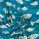 Coton matelassé double face poisson bleu et marine au mètre