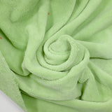 Tissu éponge bambou vert pomme vendu au mètre