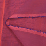 Mousseline 100% soie unie corail foncé changeant marine
