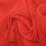 Mousseline de 100% soie unie rouge corail