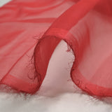 Mousseline de 100% soie unie rouge brique